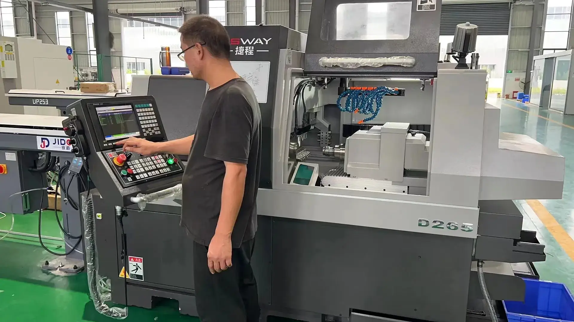 CNC lathe operator producing precision turned components