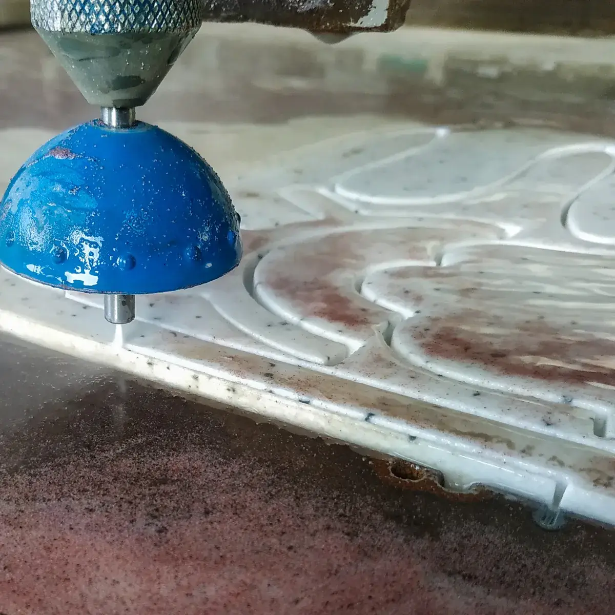 Technical ceramic component undergoing precision finishing